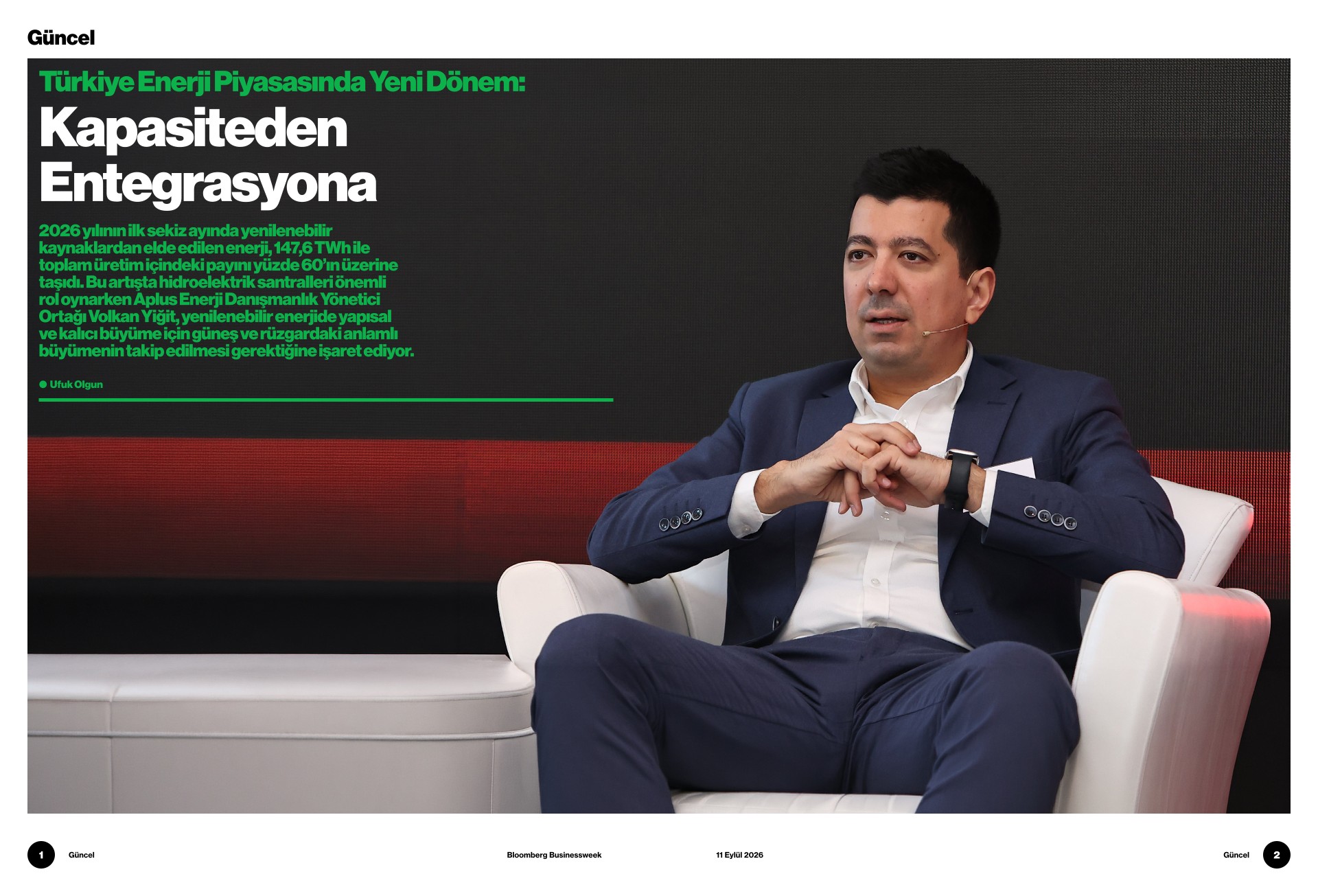 Opening spread of the “From Capacity to Integration” interview featuring a photograph of Volkan Yiğit